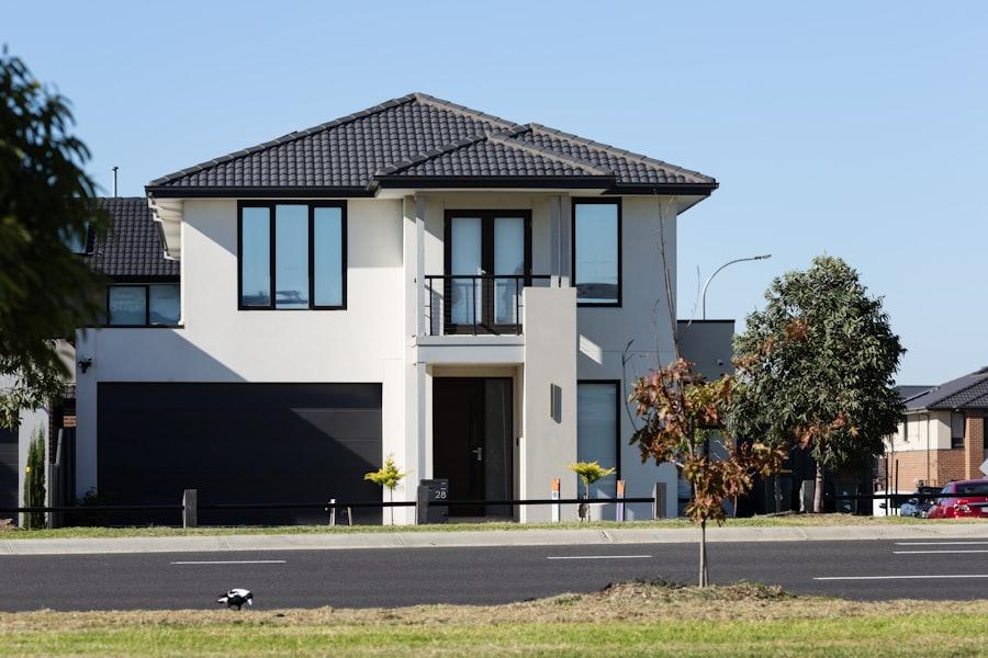 Two-story house exterior with balcony design, representative of the residential house construction style Tayyab Builders delivers in Multan